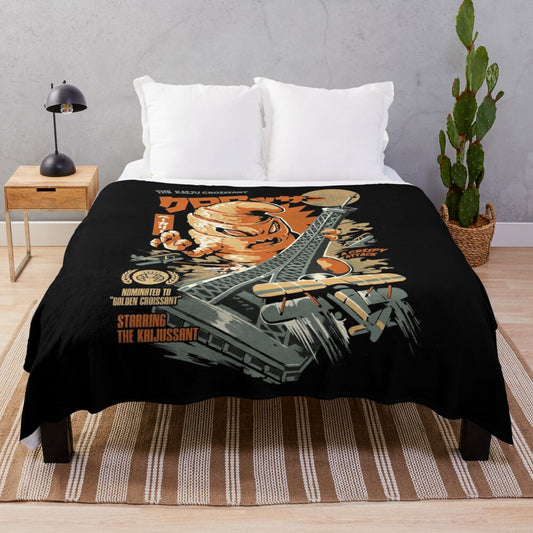 Plush blanket featuring a kaiju-inspired croissant design