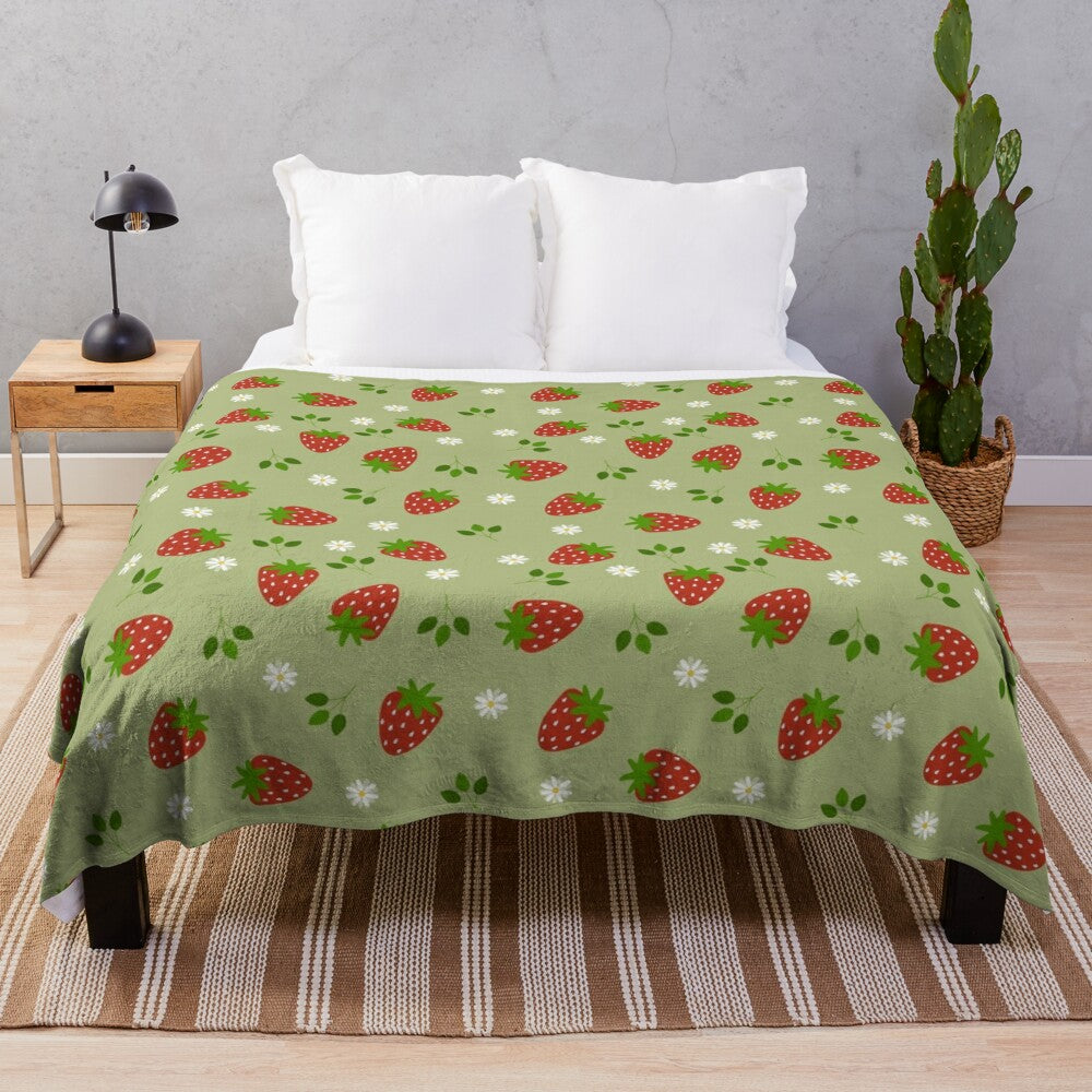 Lush plush blanket with a vibrant strawberry and daisy floral pattern