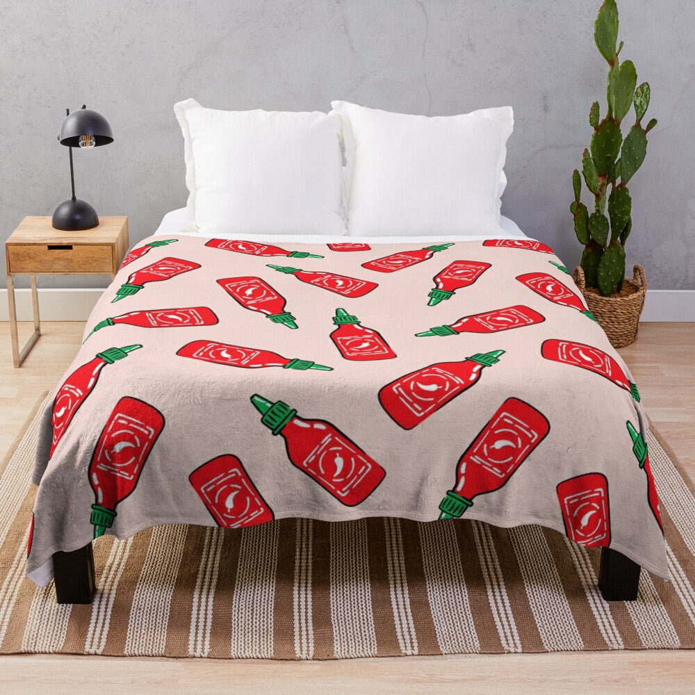 Cozy plush blanket with a spicy sauce and chili pepper design