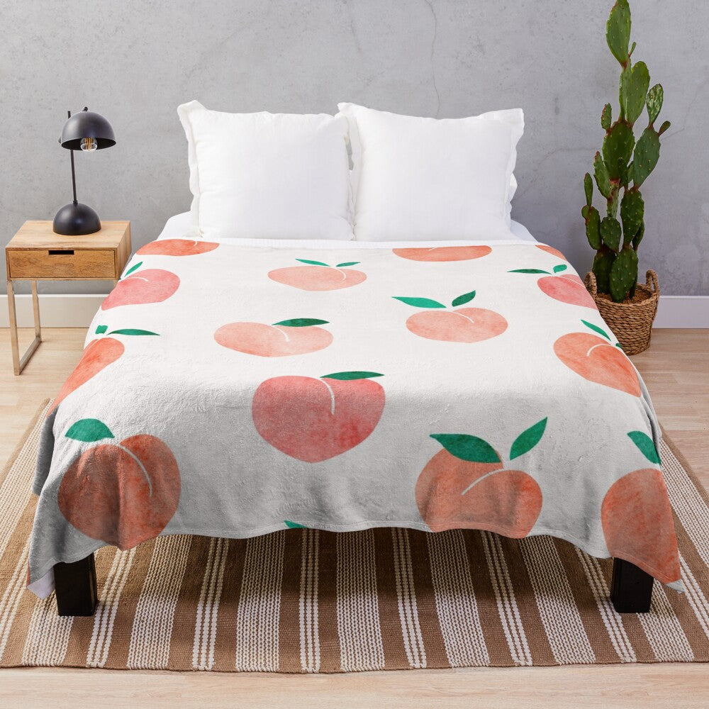 Peach-patterned plush blanket with a watercolor design