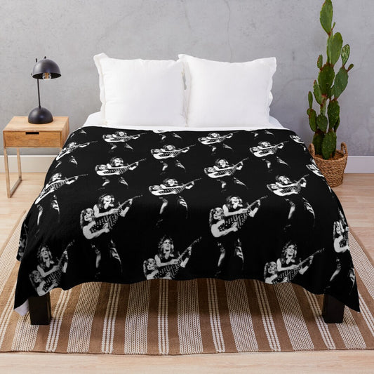 Retro plush blanket featuring a stencil design for classic rock fans