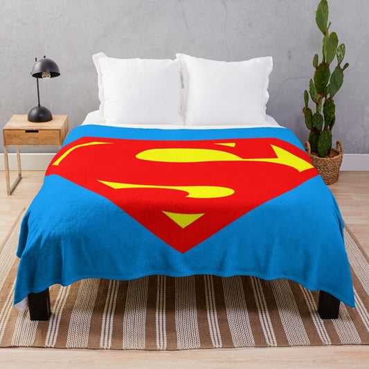 Vintage-style superhero plush blanket featuring a classic hero logo shield design