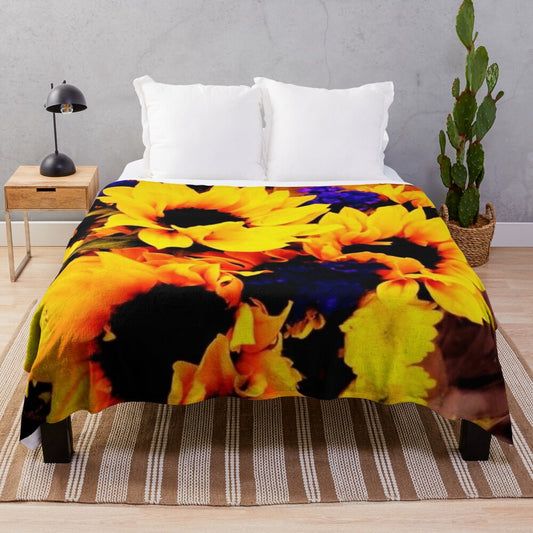 Sunflower plush blanket with yellow, red, and purple flowers