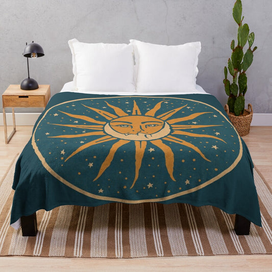 Vintage-style plush blanket featuring a sun and moon celestial art design