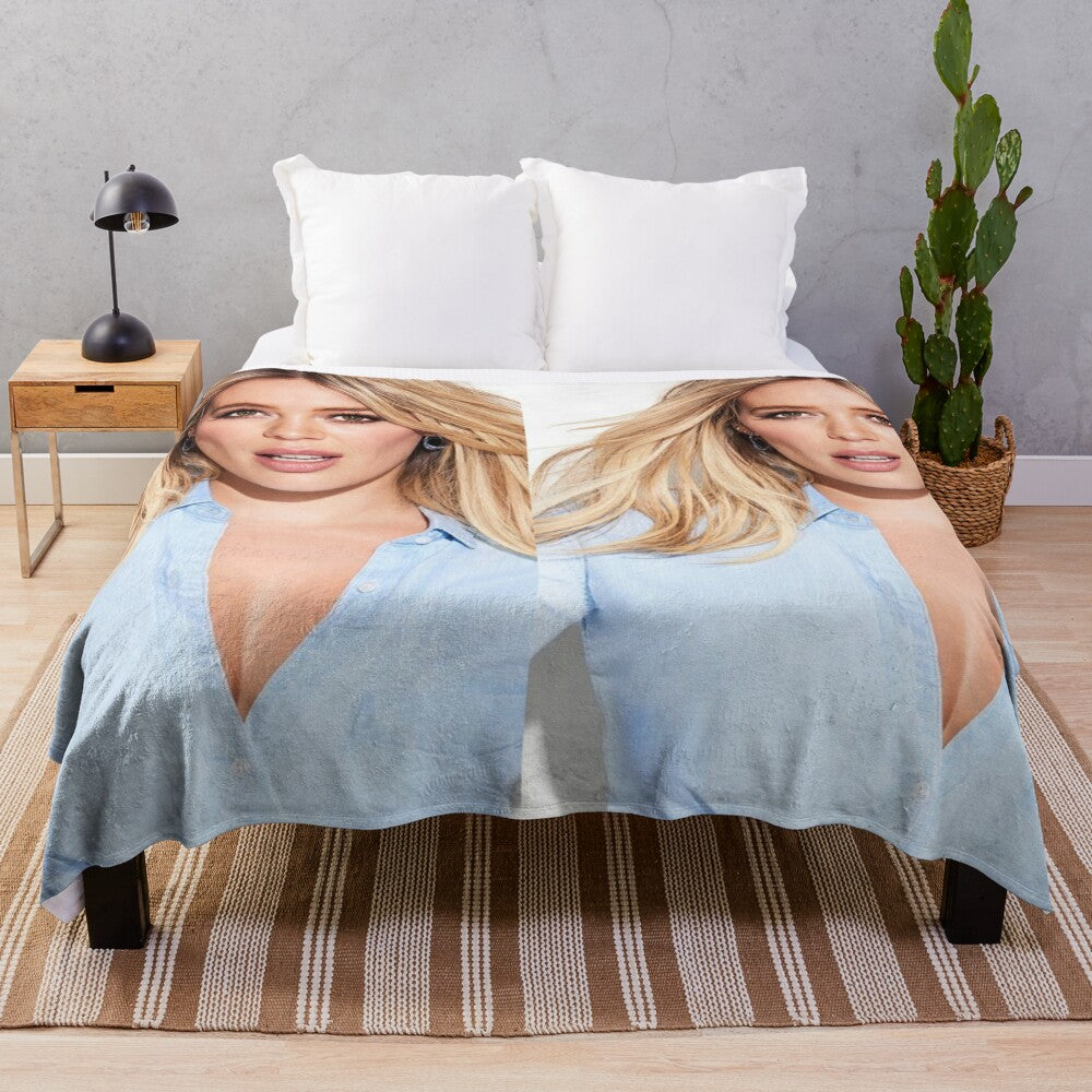 Soft and cuddly plush blanket featuring Hilary Duff, popular singer and actress