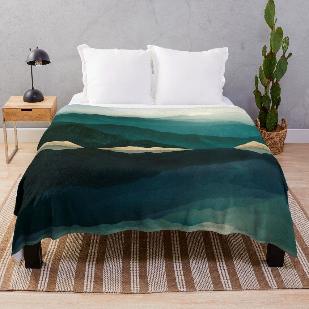 Plush blanket with a nature landscape reflection design