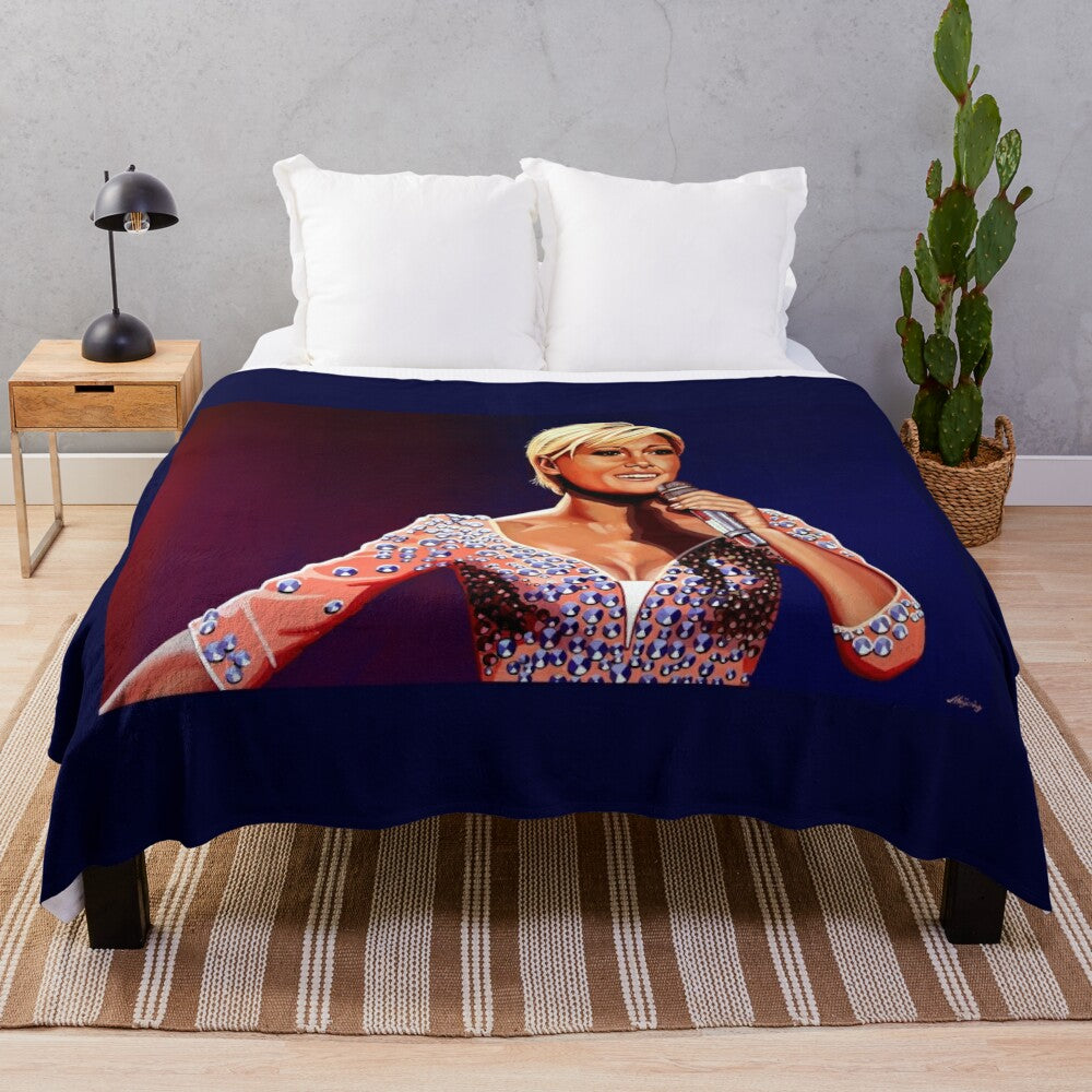 Plush blanket featuring a realistic portrait painting of German singer Helene Fischer