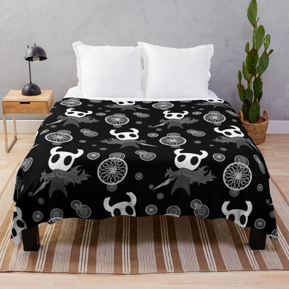 Hollow Knight inspired plush blanket with black and white pattern design