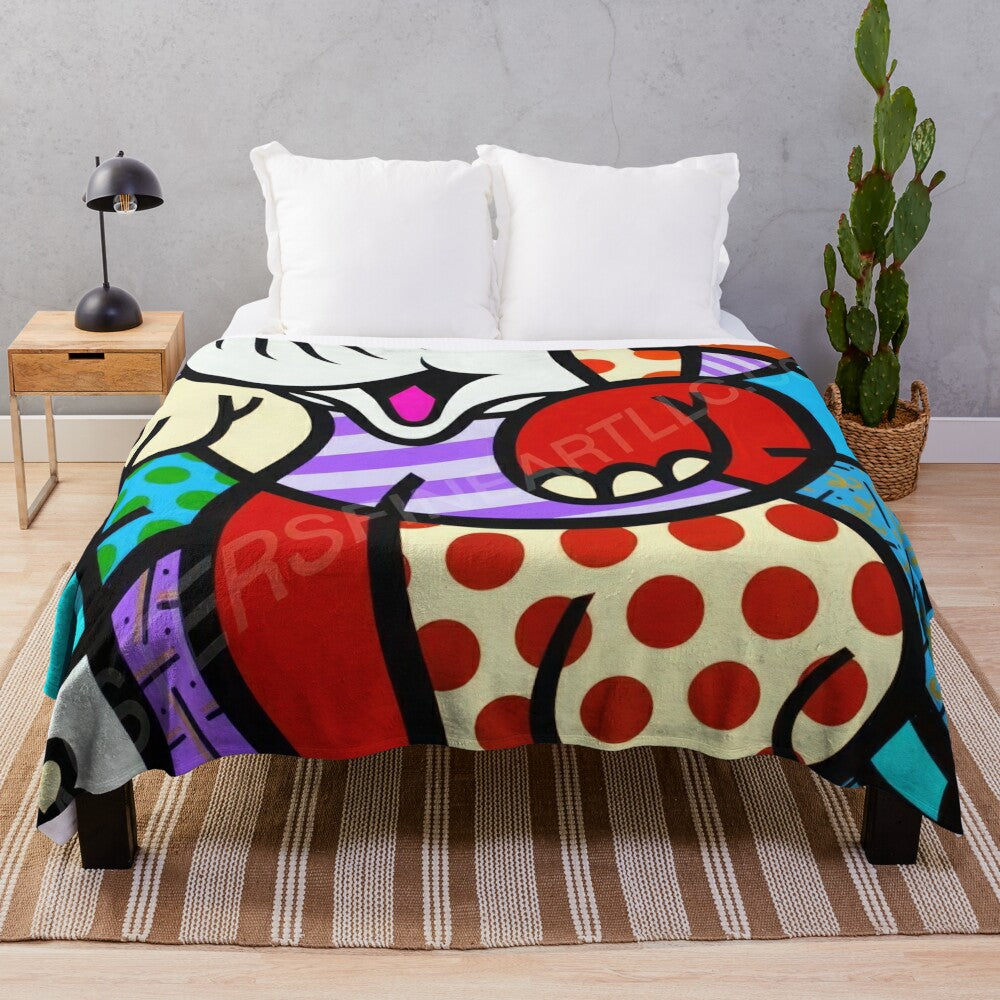 Vibrant Romero Britto-inspired plush blanket with bold patterns and contemporary art design