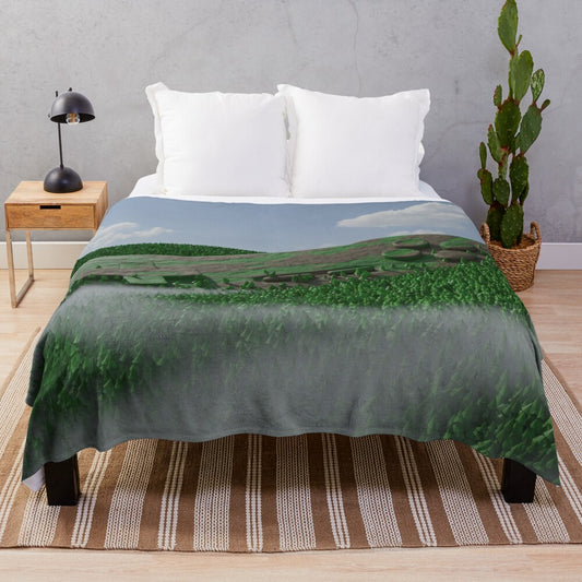 Plush blanket featuring a hidden gamepad in a whimsical, surreal forest landscape