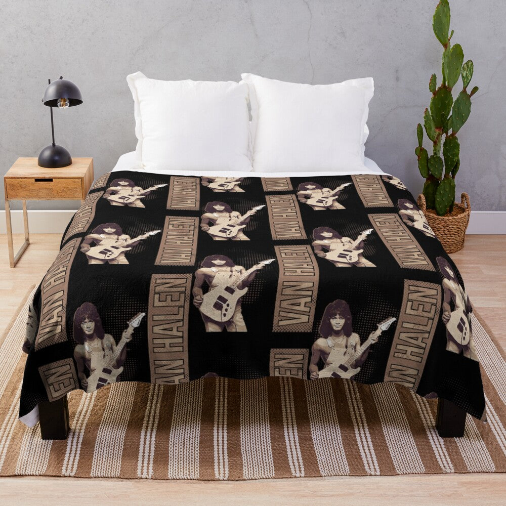 Vintage-inspired plush blanket featuring classic music band logo and design