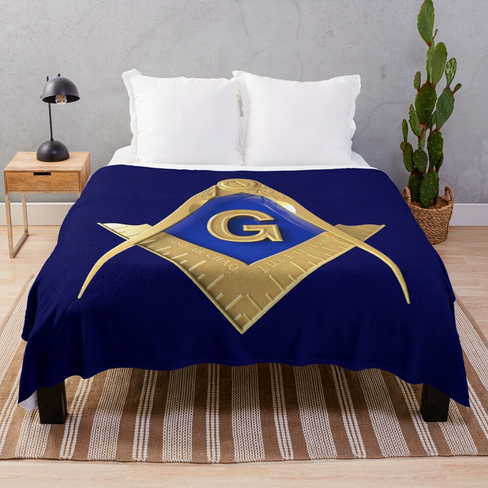 Freemason-inspired blue and gold plush blanket with square and compass masonic symbol