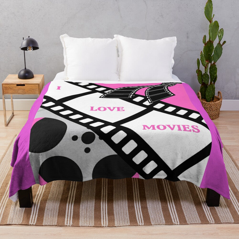 Cozy plush blanket for movie lovers featuring a "I LOVE MOVIES" design