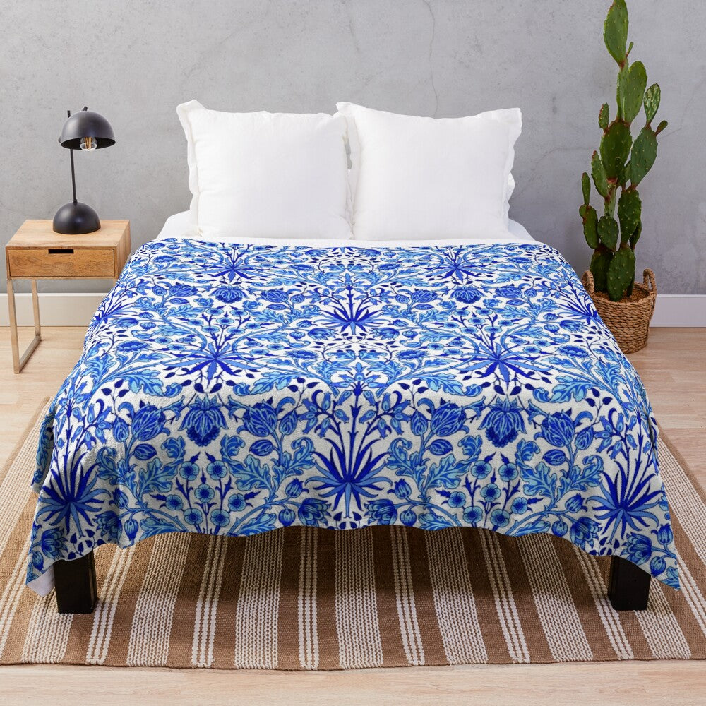 William Morris-inspired hyacinth floral print plush blanket in cobalt blue and white