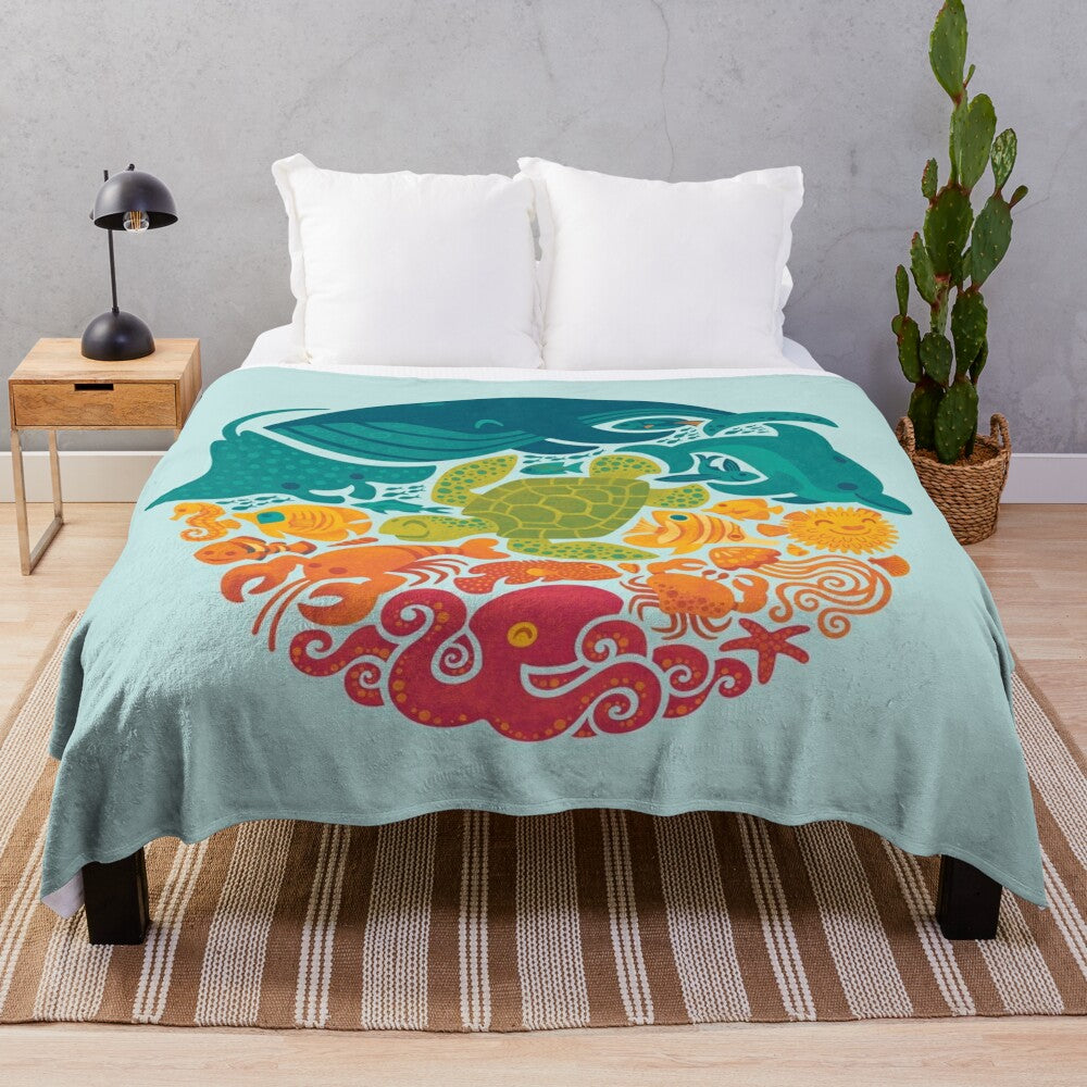 Aquatic plush blanket with vibrant sea creatures and marine life