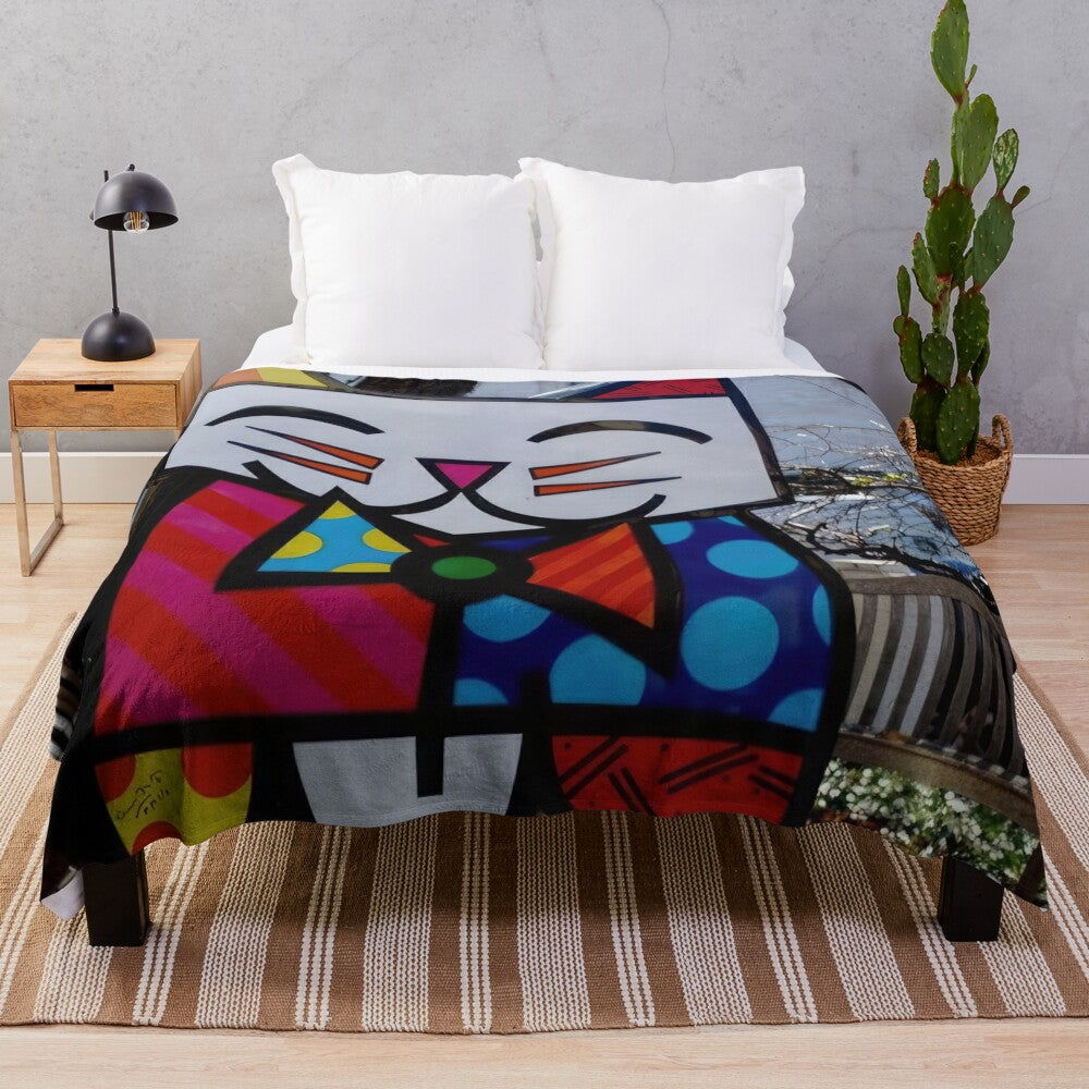 Colorful pop art-inspired plush blanket featuring the iconic artwork of Brazilian artist Romero Britto