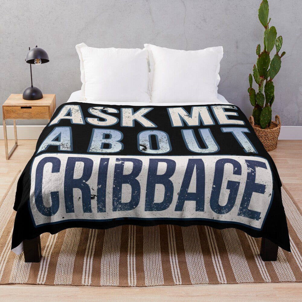 Plush blanket with cribbage-inspired design and text