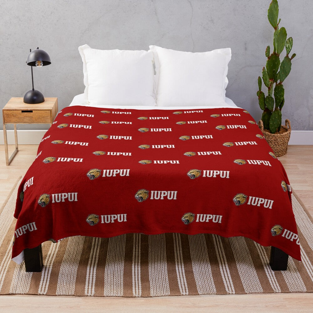 Soft and comfortable plush blanket featuring the IUPUI Jaguars logo and wordmark