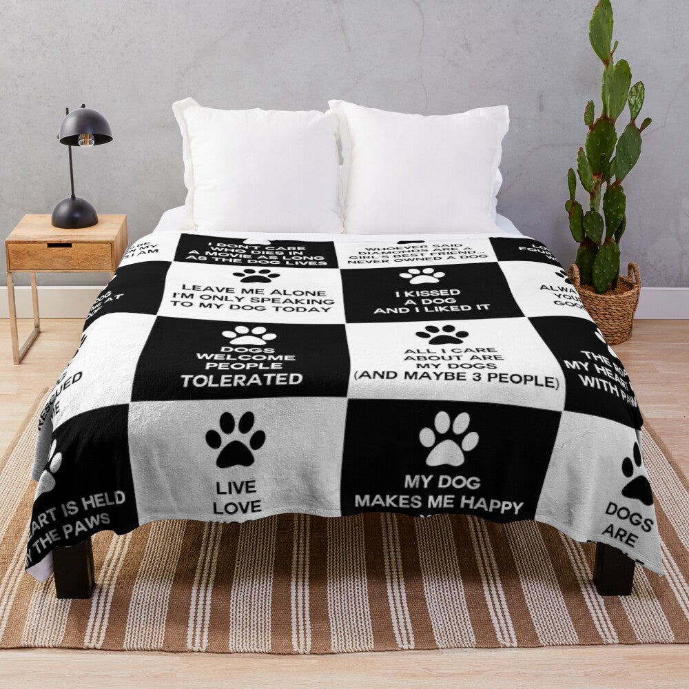 Plush dog lover blanket with black and white checkered pattern and dog quotes