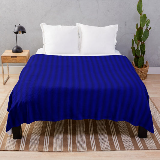 Royal blue plush blanket with a luxurious, soft texture for cozy winter nights