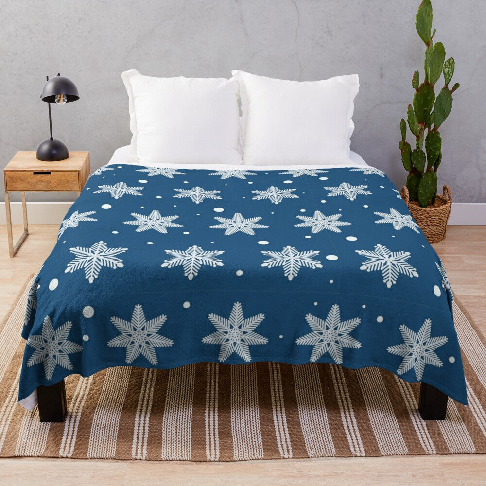 Soft and plush winter blanket with intricate snowflake design