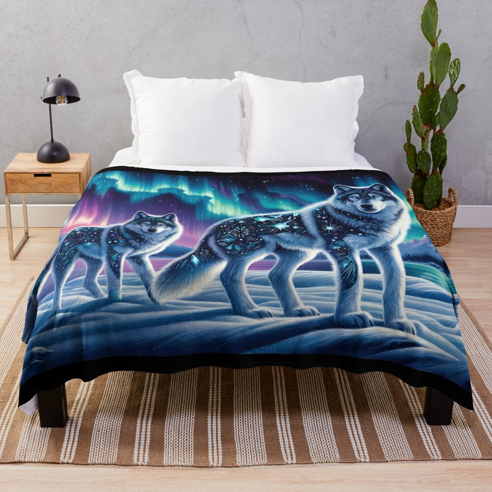 Plush blanket with wolves and northern lights design