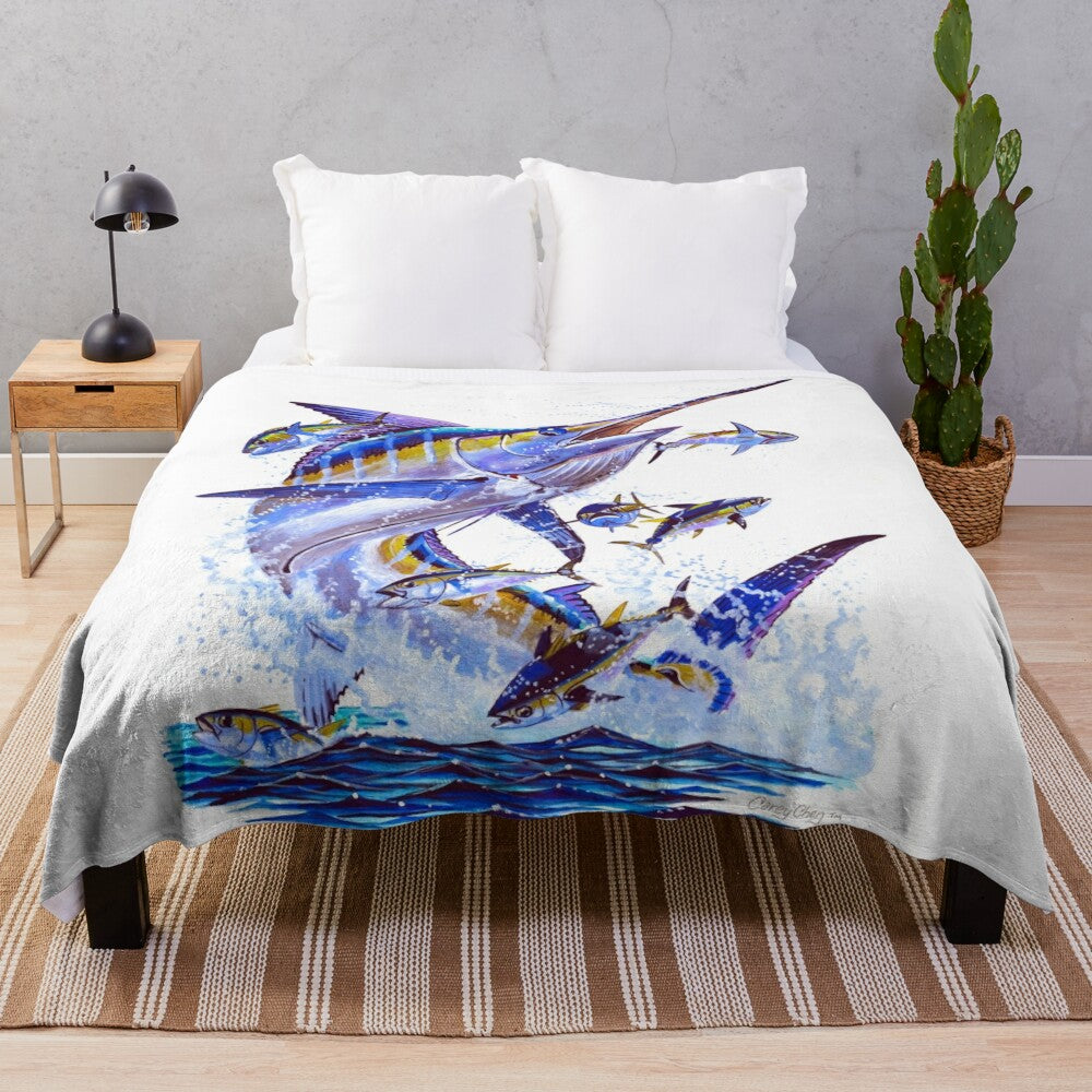 Plush blanket featuring a vibrant blue marlin and tuna design by marine artist Carey Chen