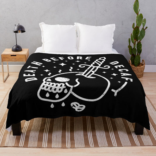 "Death Before Decaf" plush blanket featuring a skull and coffee design