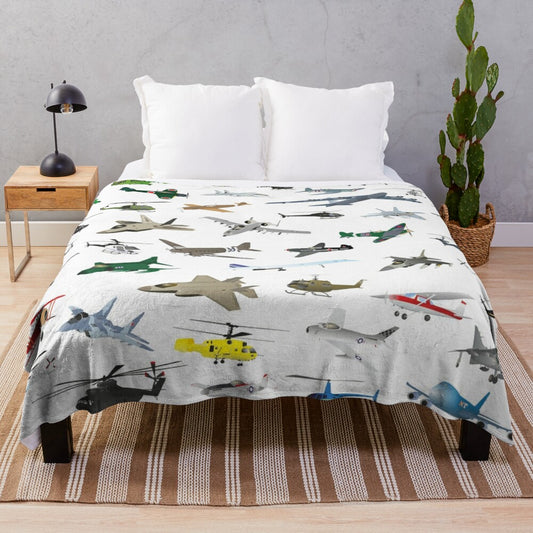 Colorful plush blanket featuring various aviation-themed patterns