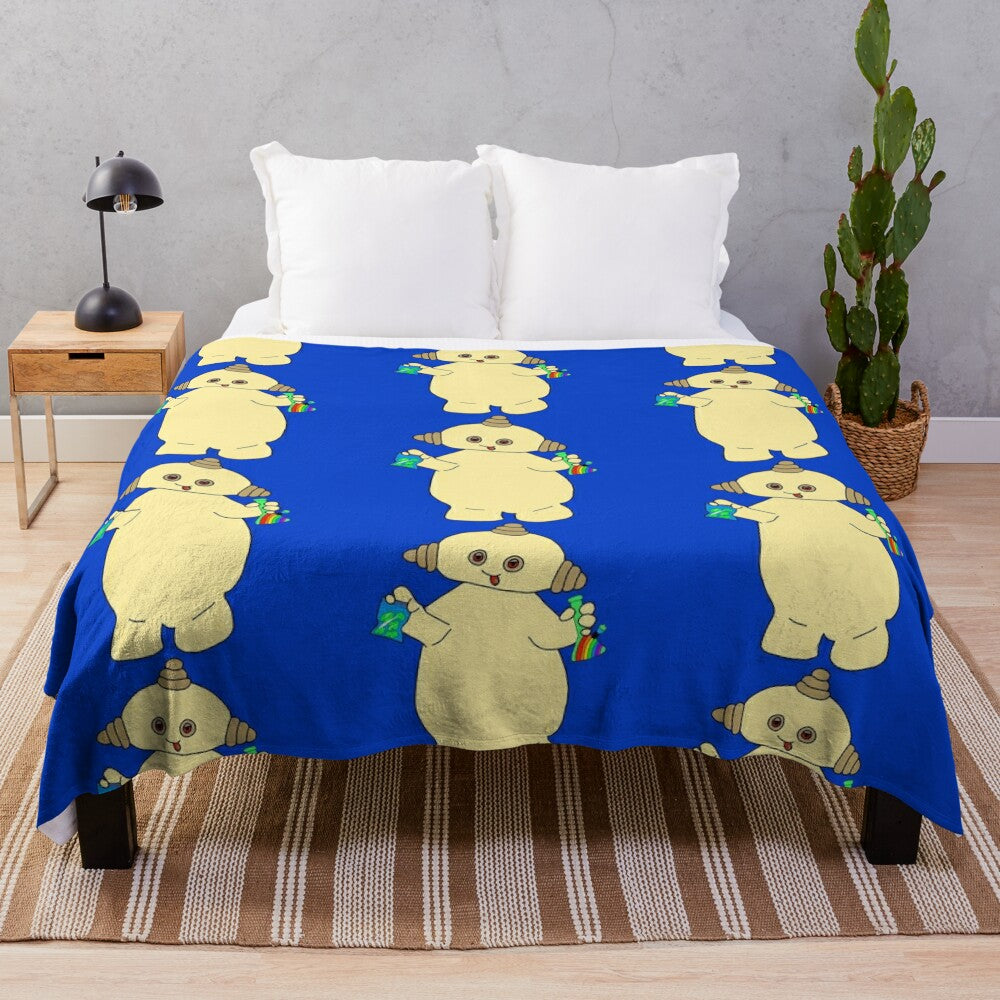 Plush blanket featuring a whimsical floral and nature-inspired design