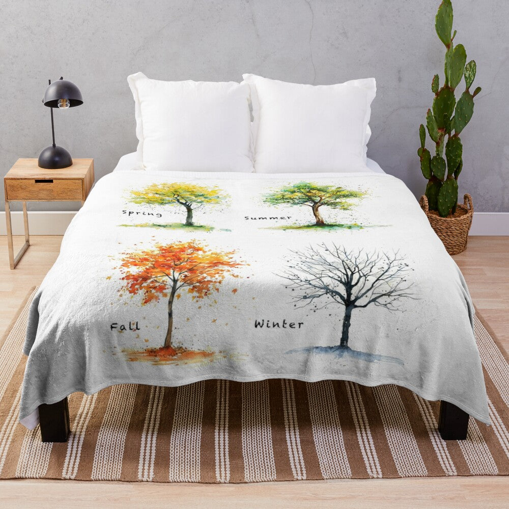 Plush blanket with colorful watercolor-style seasons design