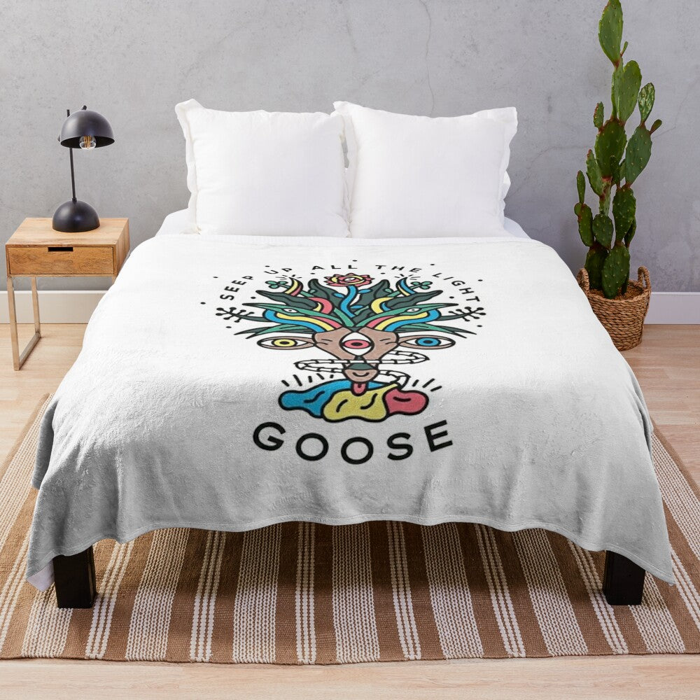 Soft and cozy plush blanket featuring the Goose band logo