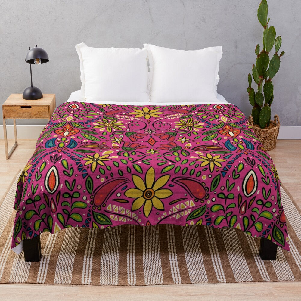 Soft and plush boho-style blanket with vibrant floral and nature-inspired pattern