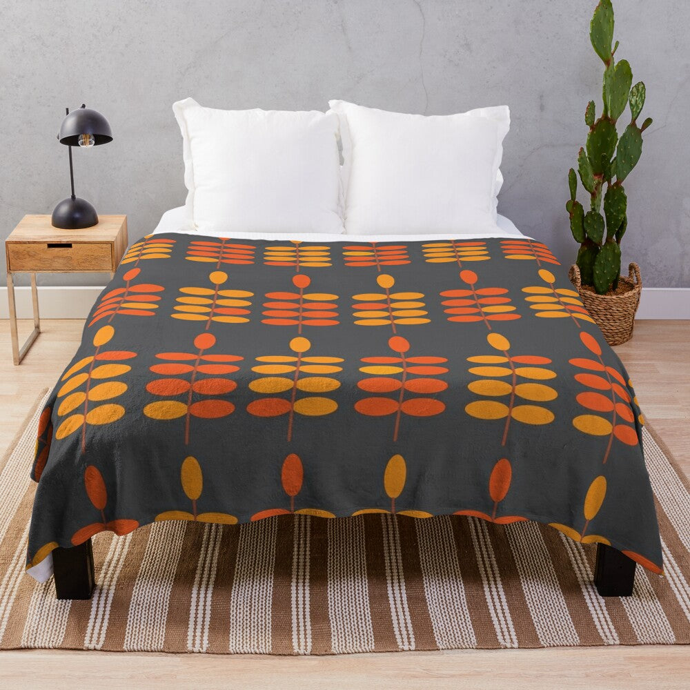 Retro orange leaves pattern on a grey plush blanket