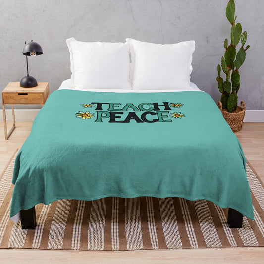 Soft plush blanket with "Teach Peace" design, perfect for educational settings and home decor.