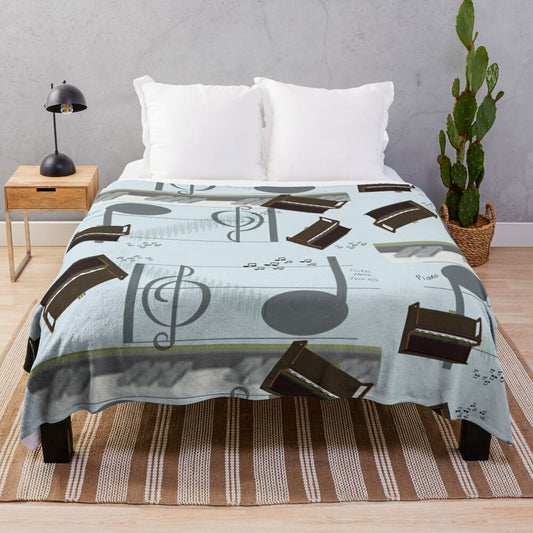 A plush blanket featuring a musical motif of piano keys and treble clef