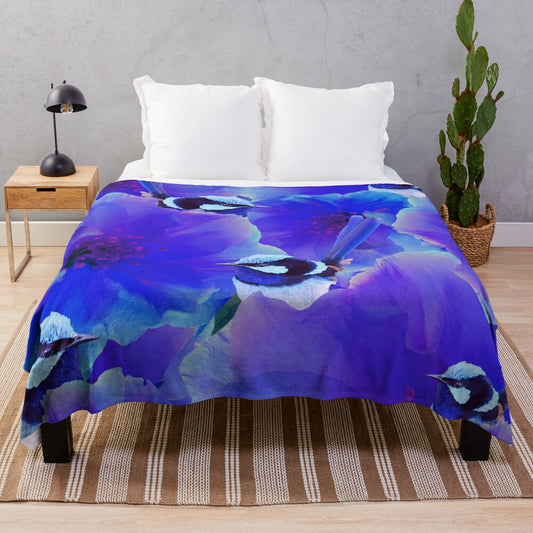 A beautiful plush blanket featuring a watercolor-style illustration of a blue wren bird perched among floral blossoms