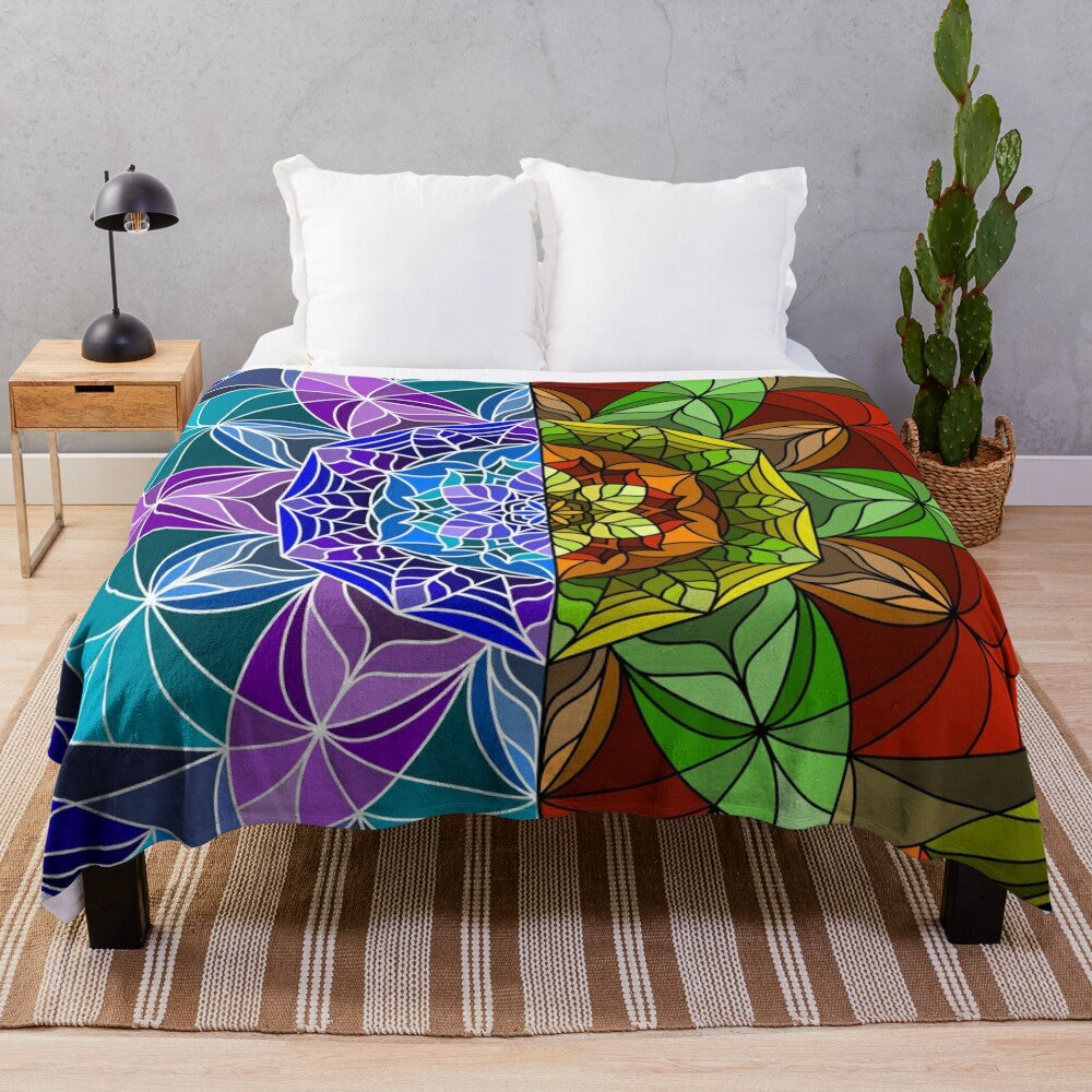 Plush blanket featuring a mandala design with autumn and winter leaves in a mismatched, symmetrical pattern