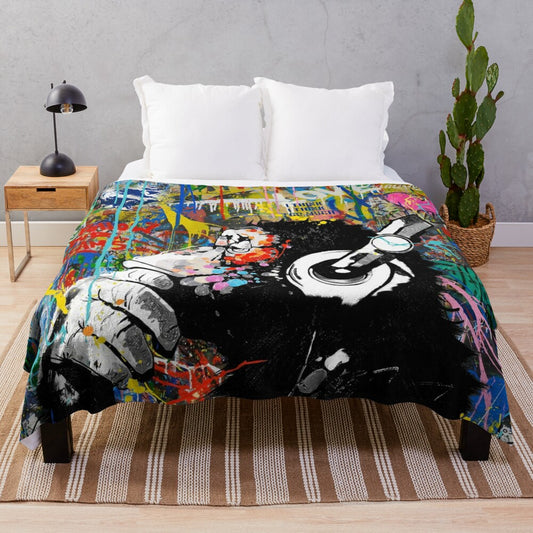 Colorful Banksy-inspired plush blanket featuring a monkey thinker urban art design