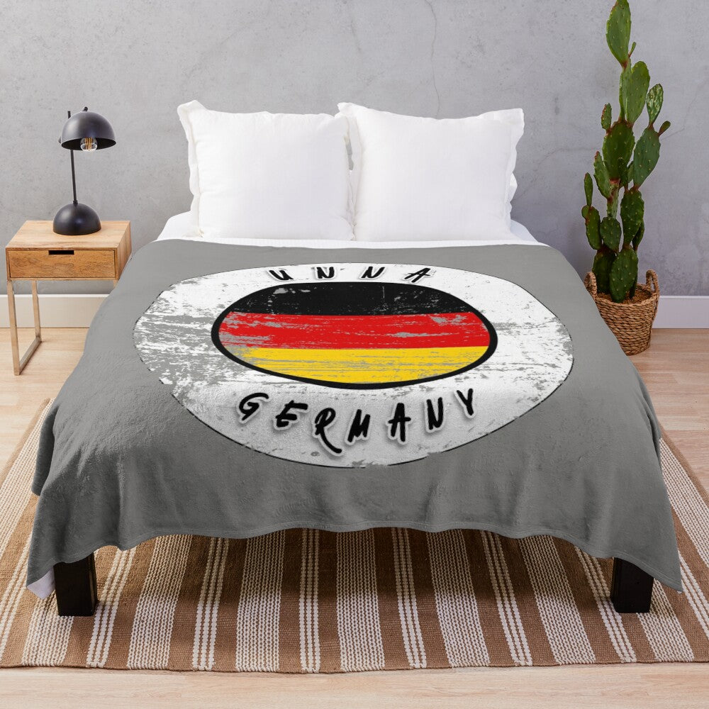 Vintage-inspired plush blanket featuring the German flag