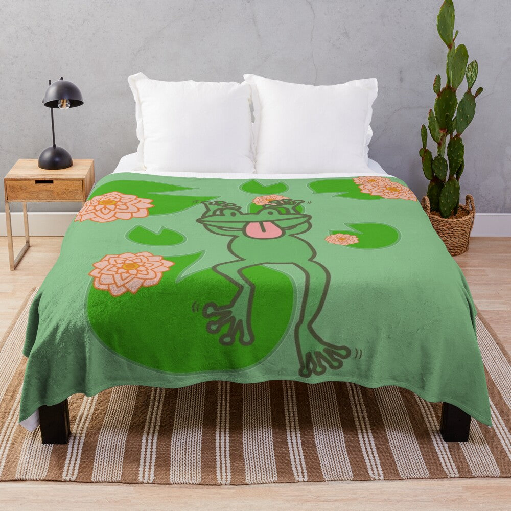 Whimsical frog plush blanket in green and pink floral design