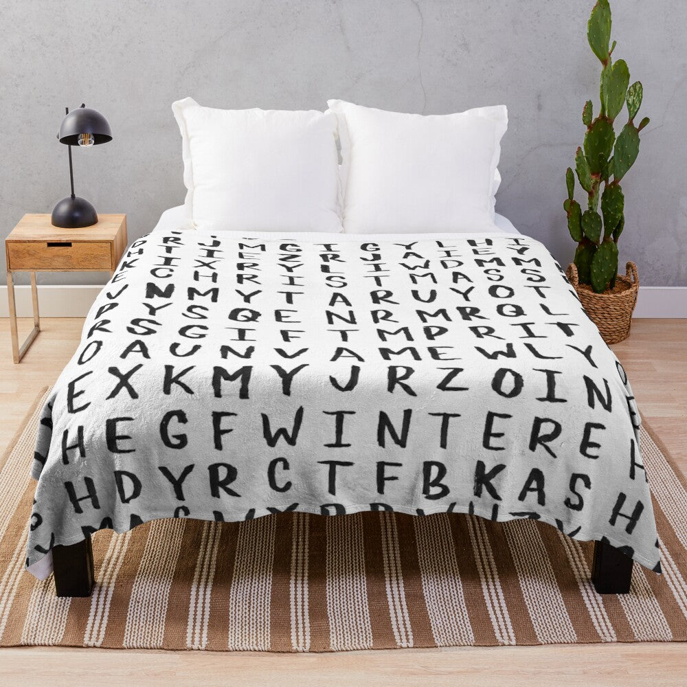 Christmas word search plush blanket with black and white lettering