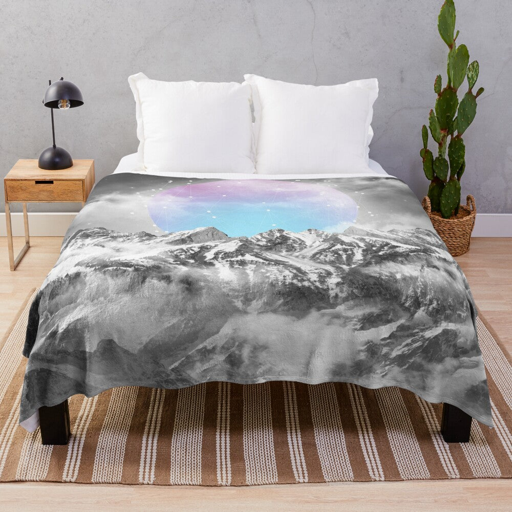 Plush blanket featuring a serene winter landscape with a glowing moon, stars, and galaxy