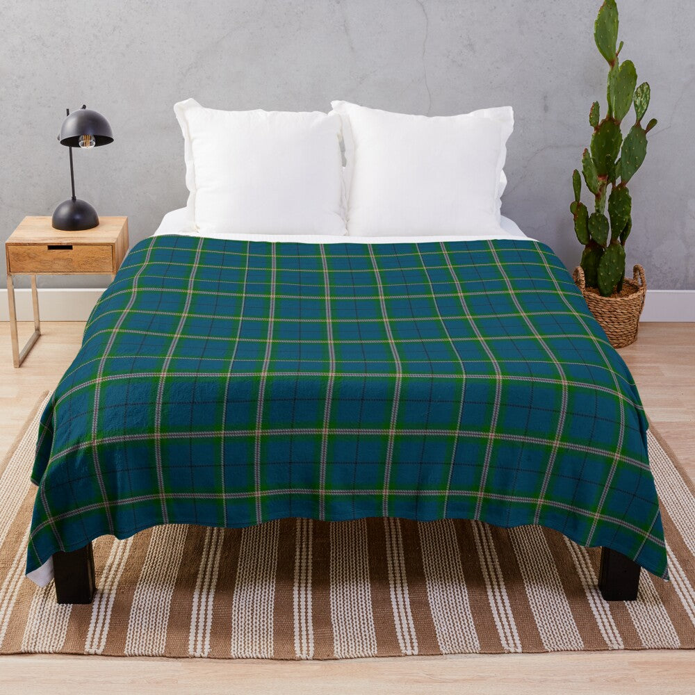 Cleland tartan plush blanket with Scottish clan crest