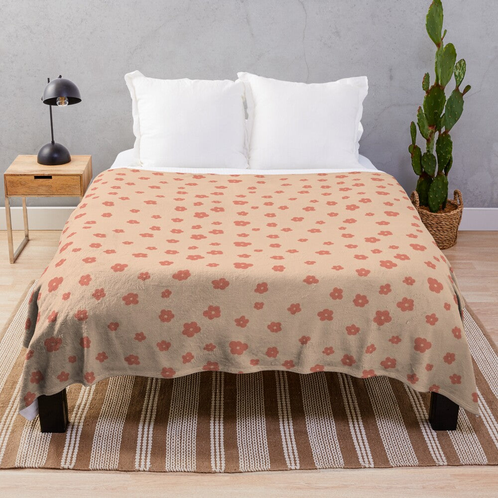 Terracotta flowers plush blanket with a soft, floral pattern perfect for spring