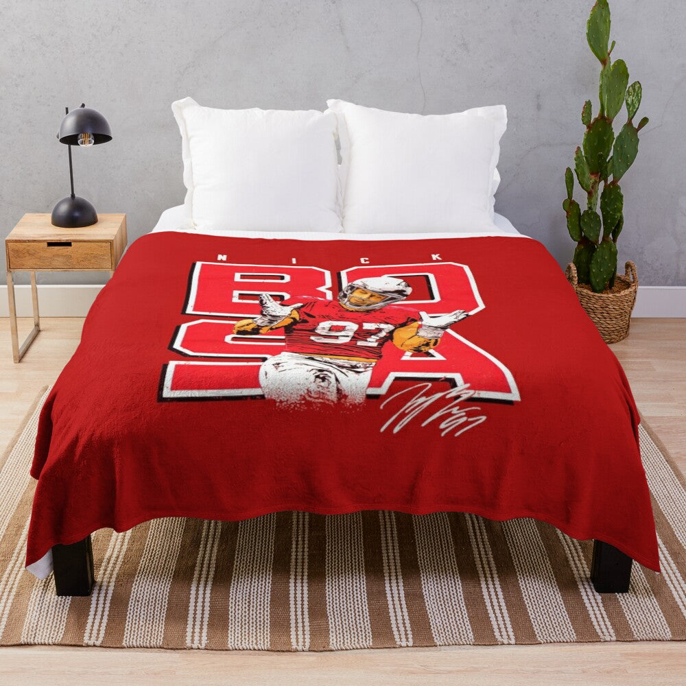 Plush blanket featuring an illustration of Nick Bosa, a star player for the San Francisco 49ers