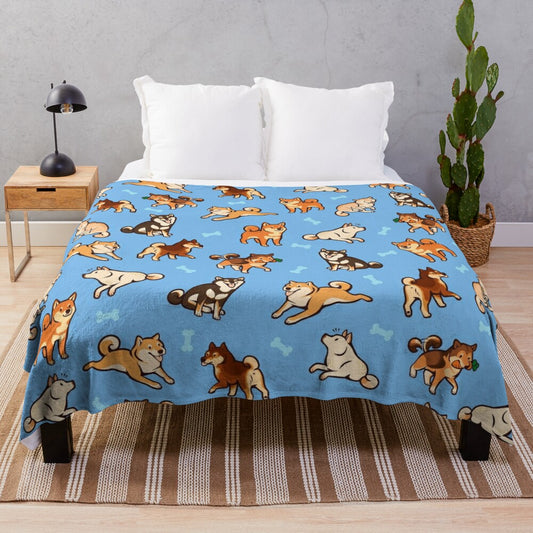 Plush blue blanket with cute shiba inu dog pattern