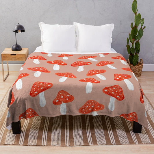 Plush blanket featuring a hand-drawn mushroom and floral pattern in soft, pastel colors