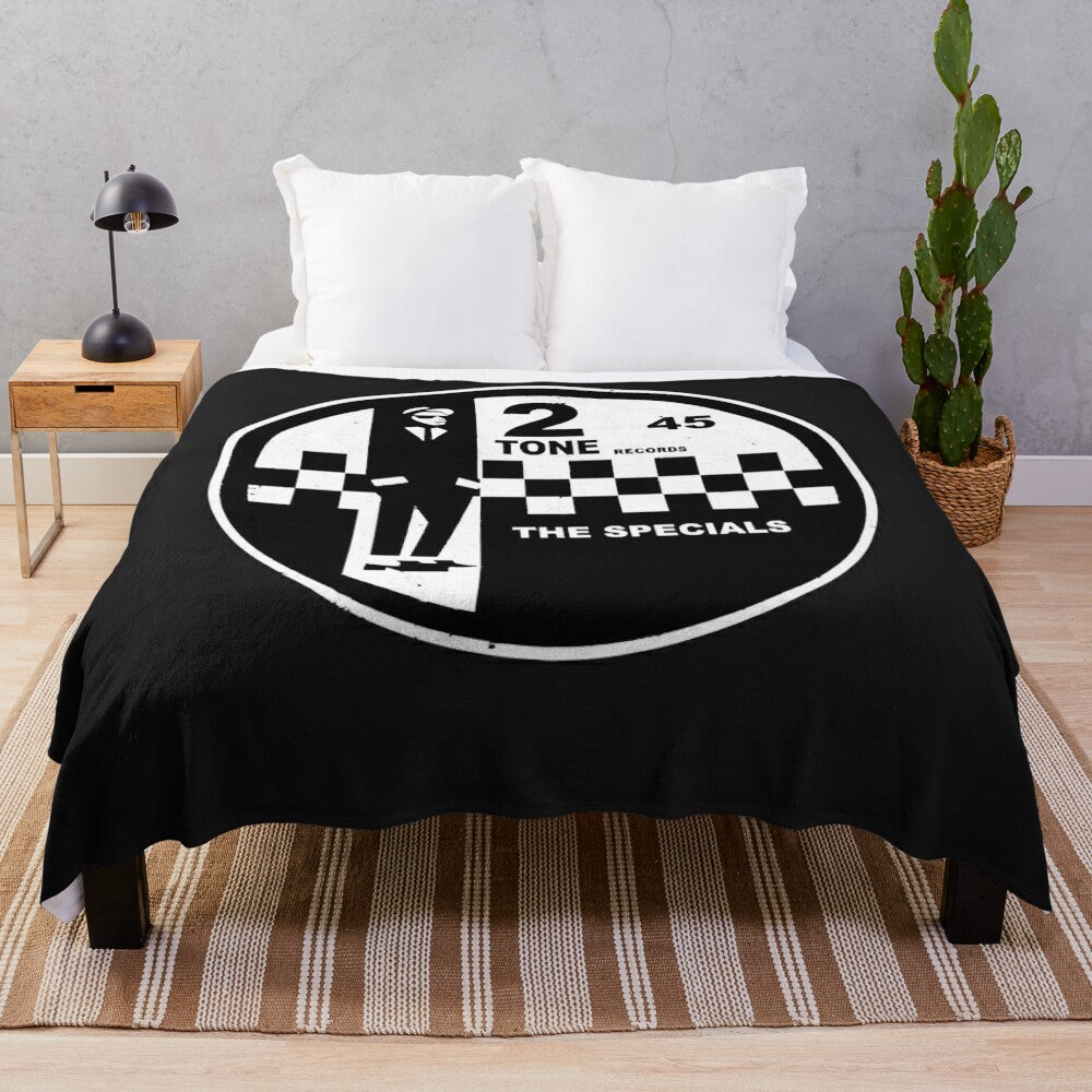 Plush blanket with 2 tone and the specials inspired design