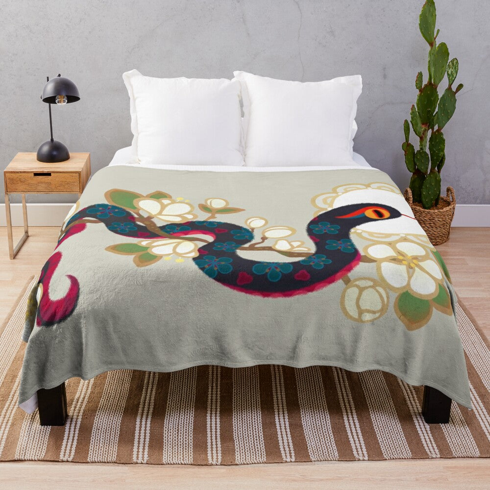 Snake and floral print plush blanket